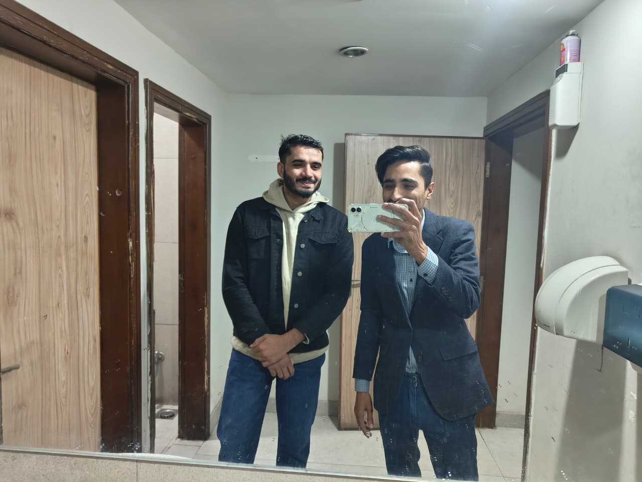 Mirror selfie with a friend